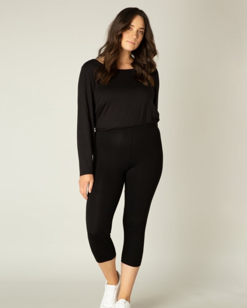 Front of a model wearing a size X-0(44) Audrey in Black by Base Level Curvy. | dia_product_style_image_id:253235